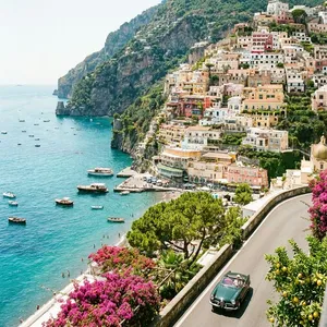 Amalfi Coast cliffside over Mediterranean Sea.